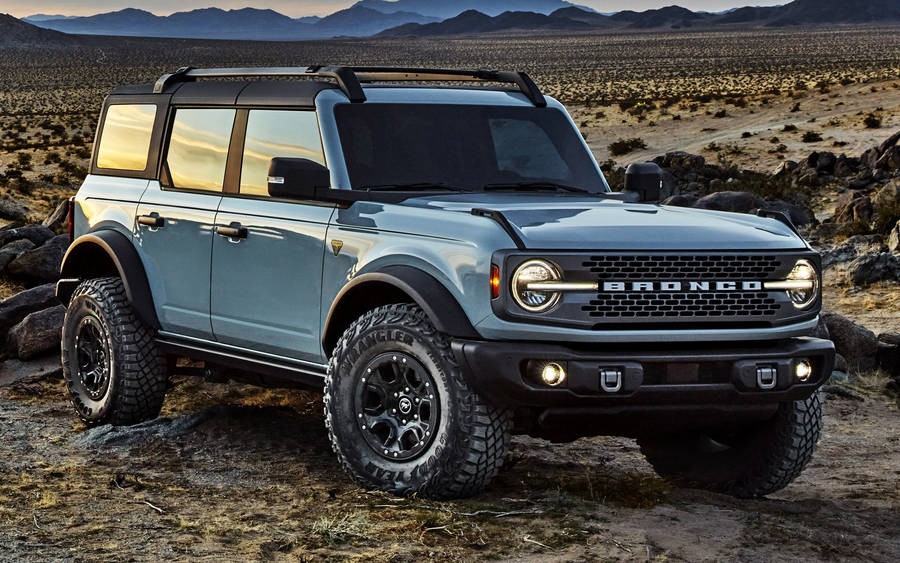 Ford Bronco On Deserted Road Wallpaper