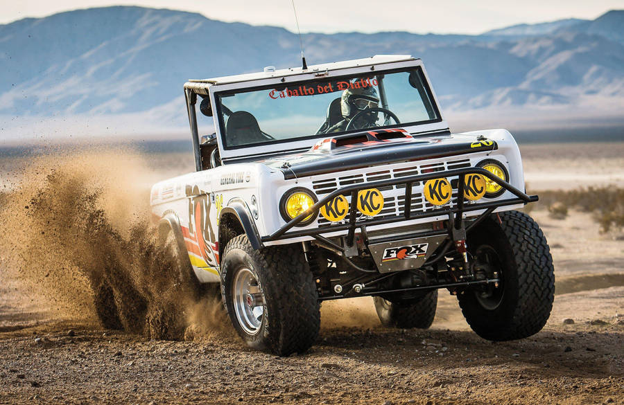 Ford Bronco Scattered Dirt And Sand Wallpaper