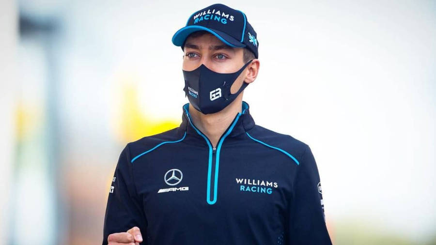 Formula 1 Racer George Russell Wearing Cap And Mask Wallpaper