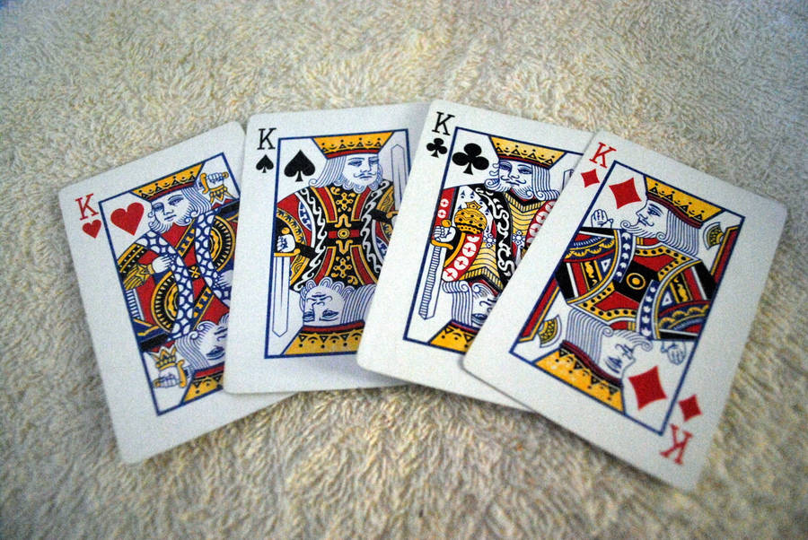 Four Of Kings Playing Cards Rug Wallpaper