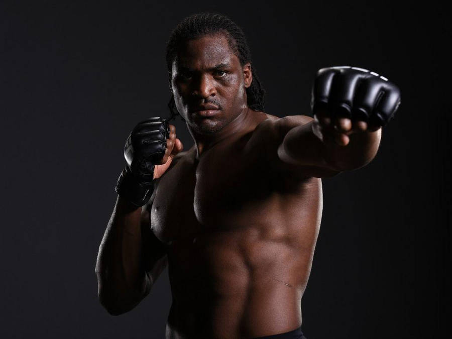 Francis Ngannou Posed Punch Wallpaper