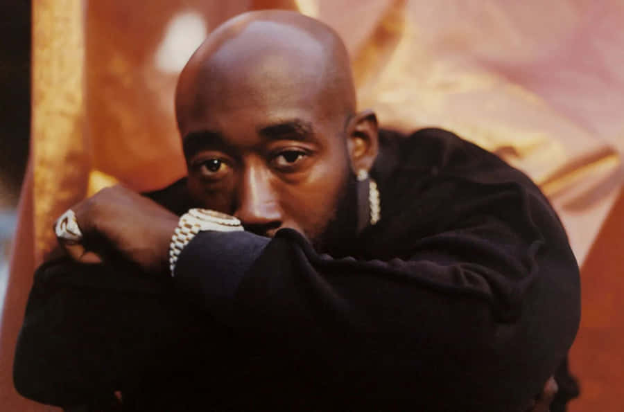 Freddie Gibbs Contemplative Pose Wallpaper