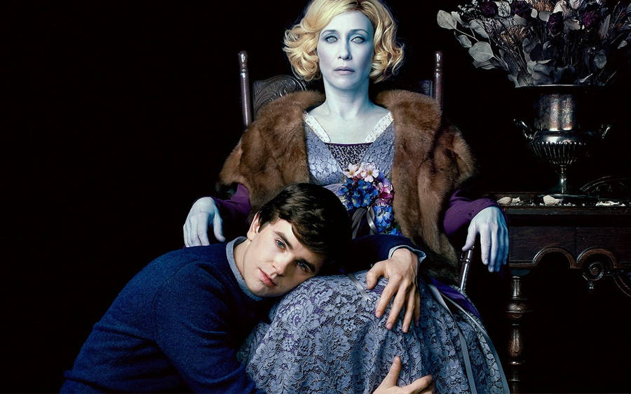 Freddie Highmore And Vera Farmiga Cover Wallpaper