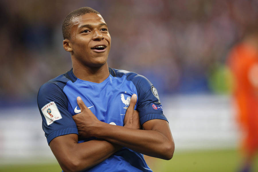 French Athlete Kylian Mbappe Wallpaper