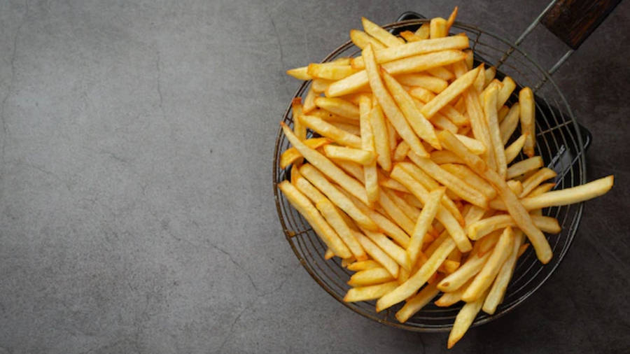 French Fries In Strainer Wallpaper