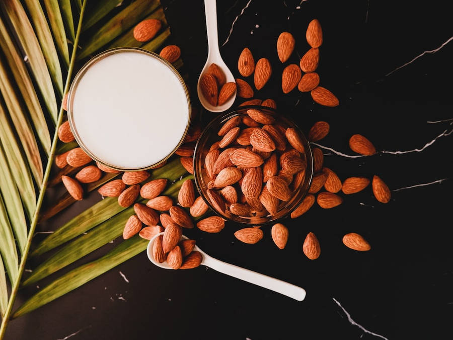 Fresh Almond Milk In A Glass Wallpaper