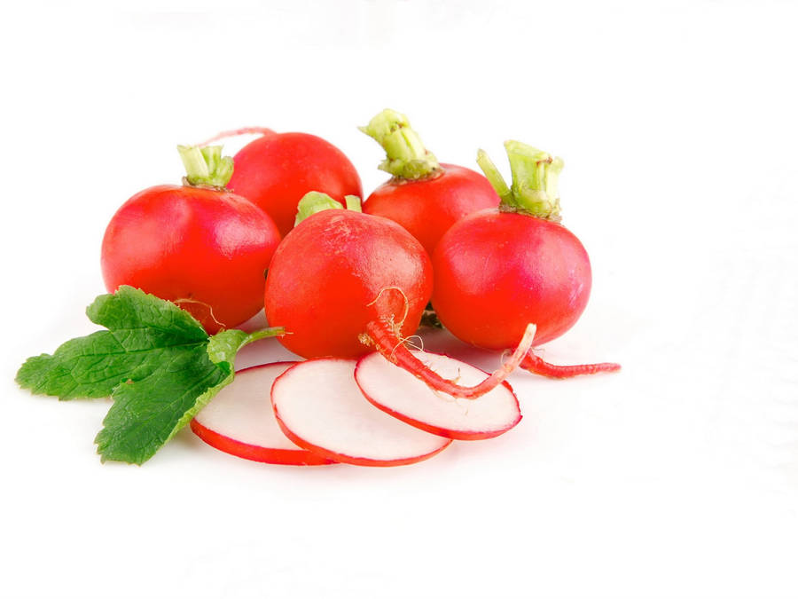 Fresh And Ripe Radish Slices On Plain Background Wallpaper