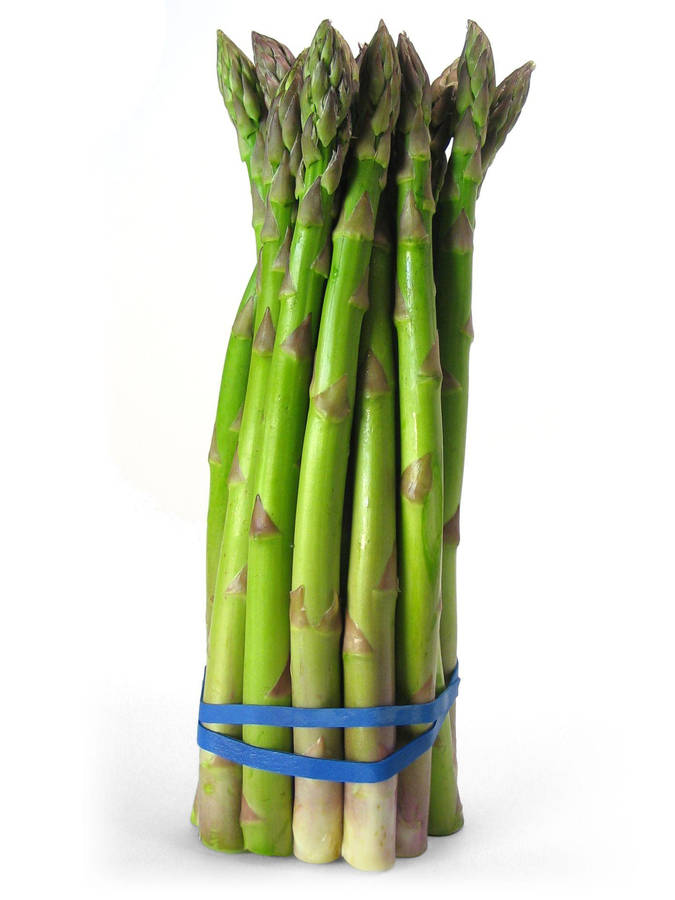 Fresh Asparagus Growing In A Perennial Garden Wallpaper