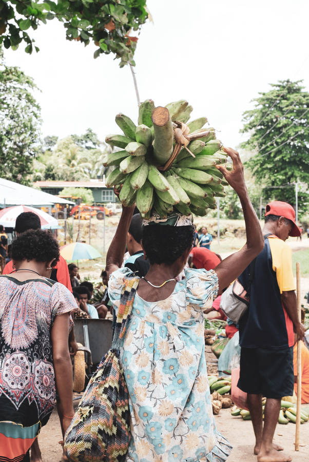 Fresh Bananas Against The Scenic Backdrop Of Papua New Guinea Wallpaper