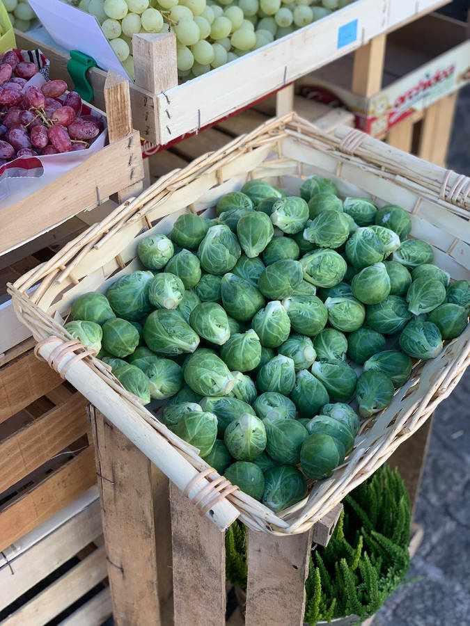 Fresh Cabbage Display In Market Wallpaper