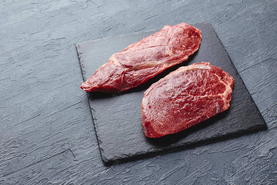 Fresh Kobe Beef On Dark Colored Board Wallpaper