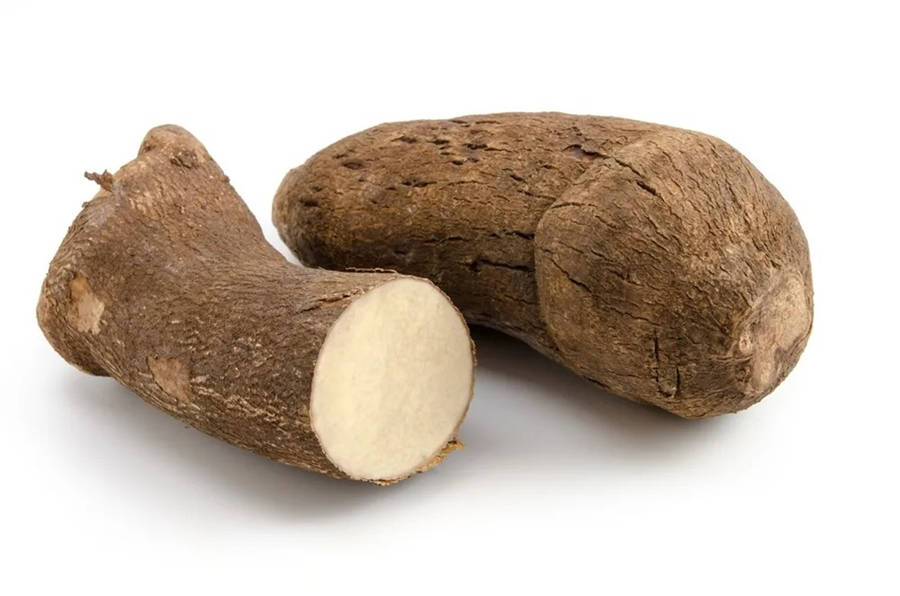 Fresh Yam On A Wooden Background Wallpaper