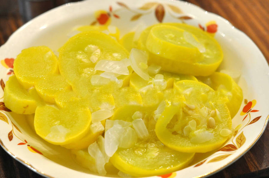 Fresh Yellow Squash Slices On Display Wallpaper