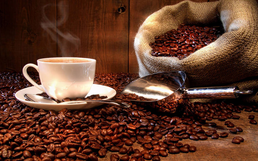 Freshly Roasted Coffee Beans Waiting To Be Enjoyed Wallpaper