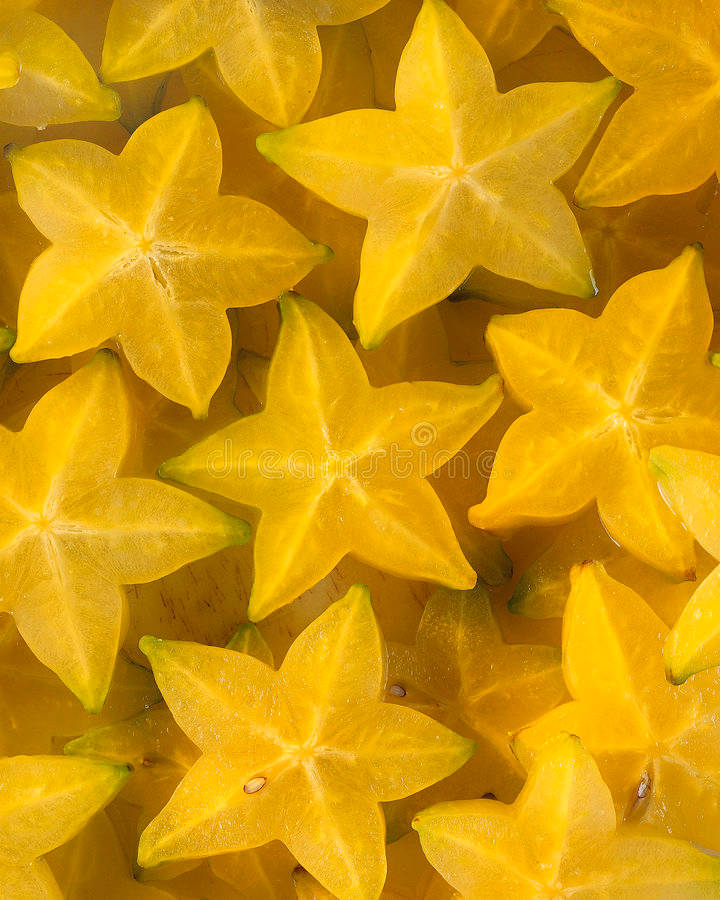 Freshly Sliced Yellow Star Fruit Wallpaper