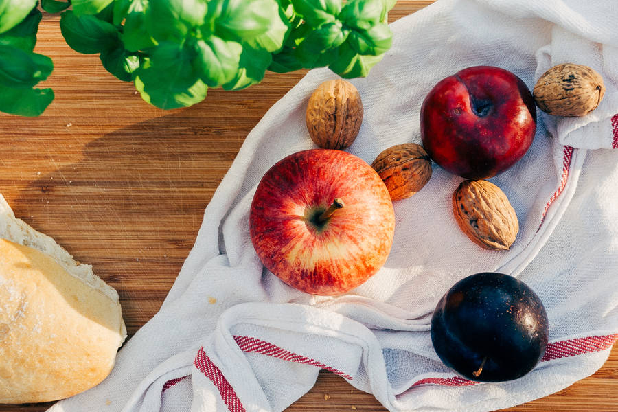 Fruits And Nuts On Table Wallpaper