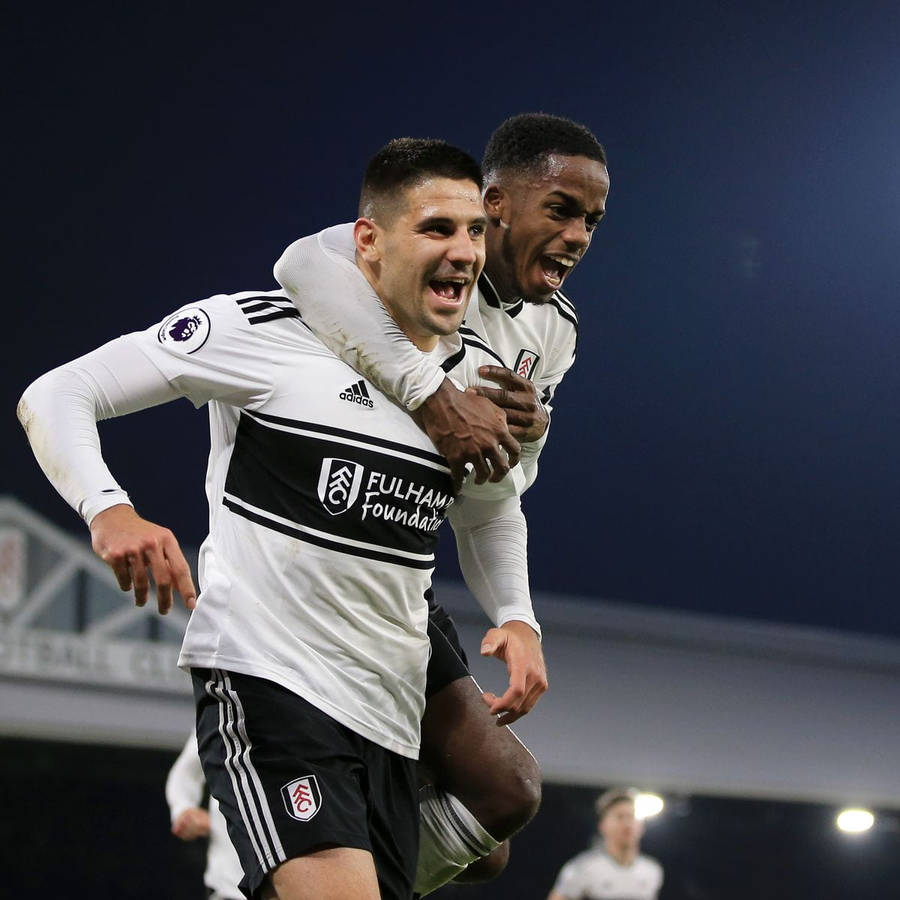 Fulham Fc Player Carrying Wallpaper