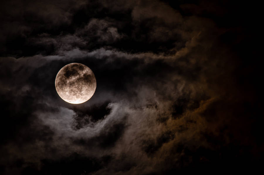 Full Moon In Dark Cloudy Sky Wallpaper