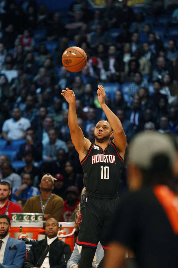 Fulminating Houston Rockets' Shooting Guard Eric Gordon During His Phenomenal 3-point Shot Wallpaper