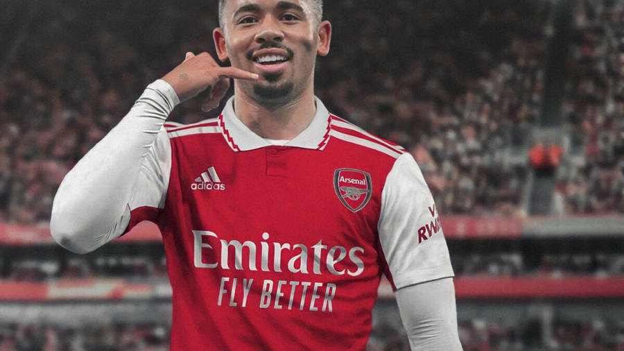 Gabriel Jesus In Red Phone Gesture Wallpaper