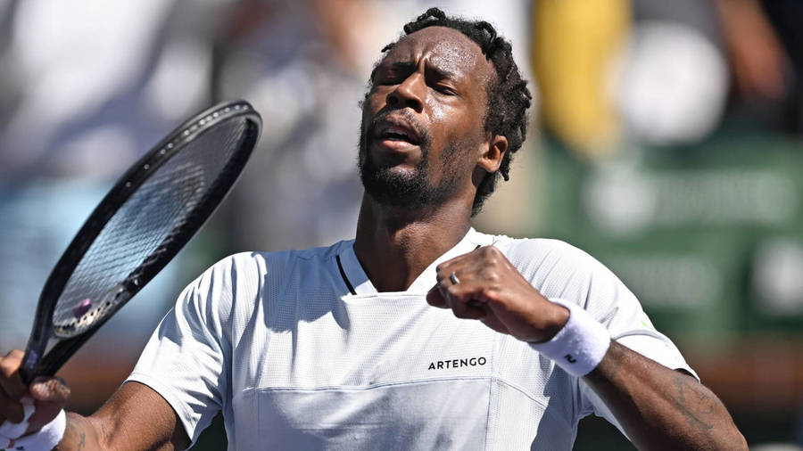 Gael Monfils Elegantly Dressed In A White Shirt Wallpaper