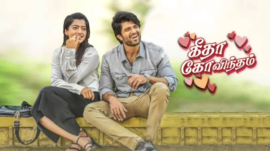 Geetha Govindam Pair Sitting By Bench Wallpaper