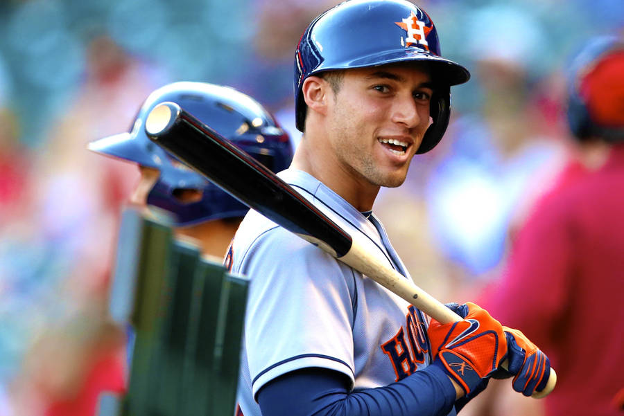 George Springer Holding A Baseball Bat Smiling Wallpaper