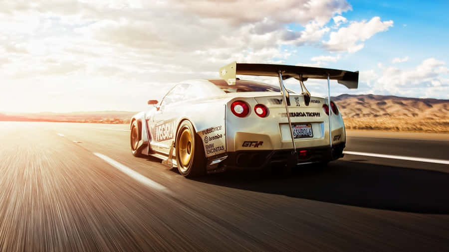 Get Ready For A Revolutionized Ride With Gtr R35 Wallpaper