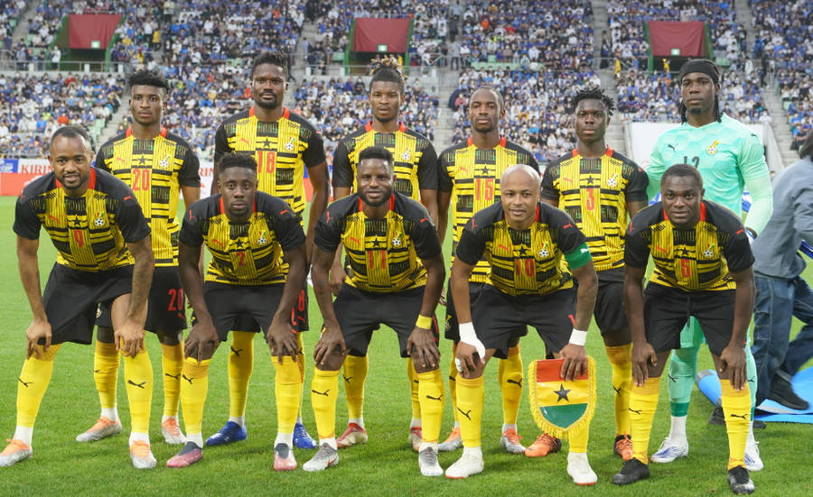 Ghana National Football Team In Yellow Wallpaper