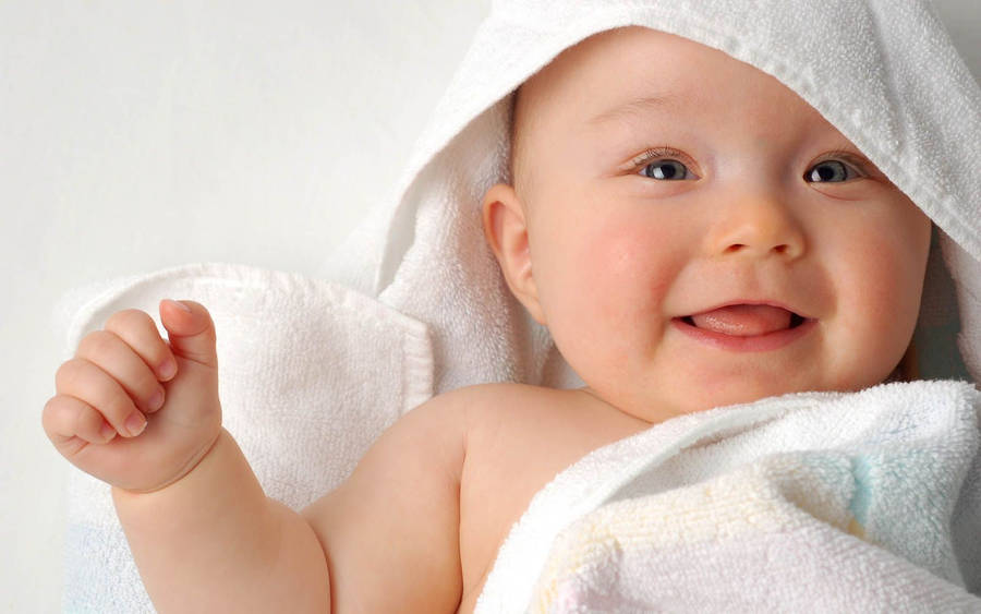 Giggling Newborn Baby Wallpaper