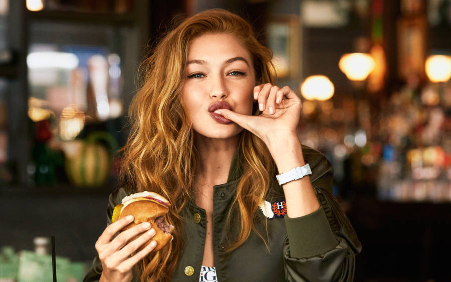 Gigi Hadid Burger Indulgence Wallpaper