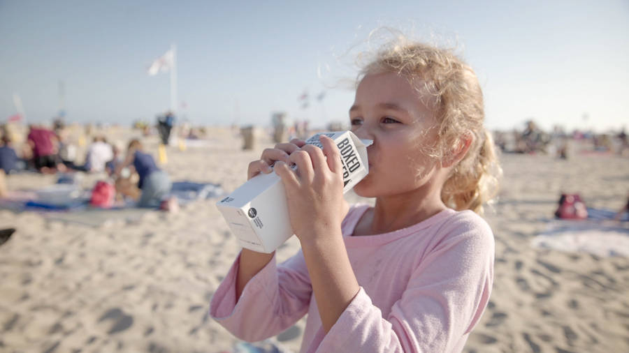 Girl Drinking Water From Box Wallpaper