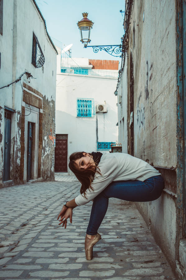 Girl In Street Of Tunisia Wallpaper