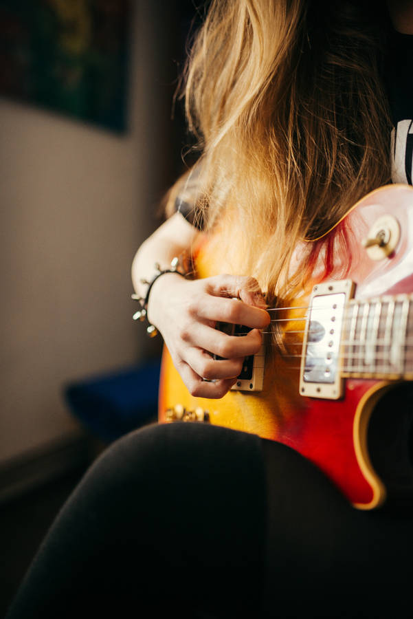 Girl Playing Electric Guitar Wallpaper