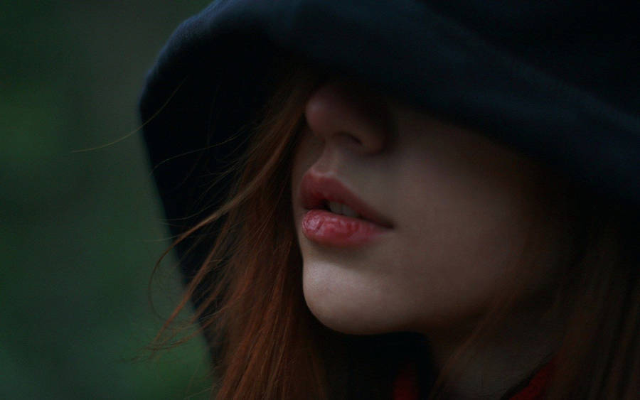 Girl Wearing Hoodie Close Up Wallpaper