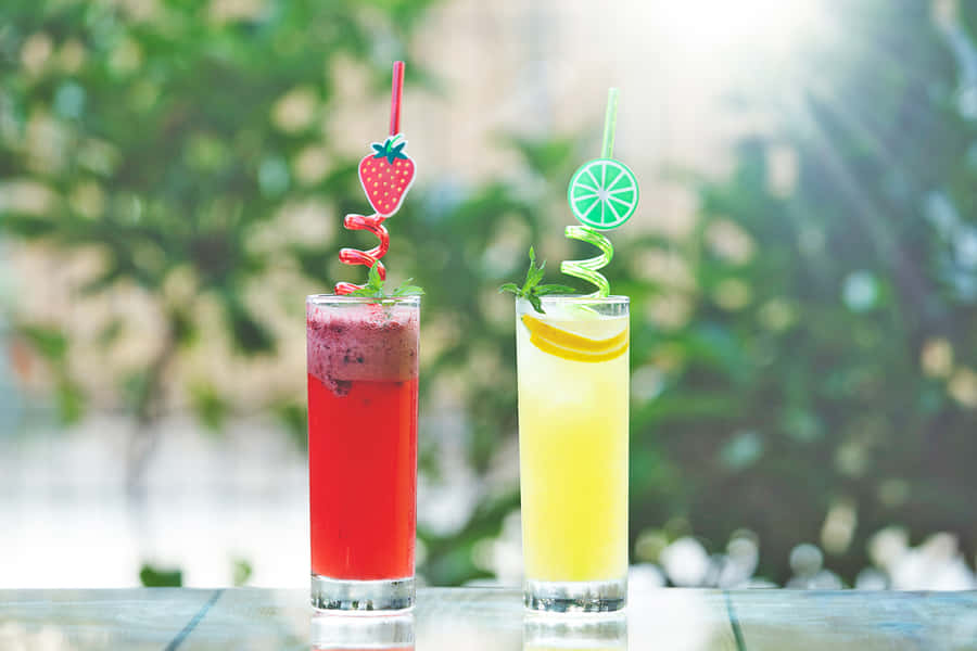 Glasses Of Strawberry And Lime Drinks Wallpaper