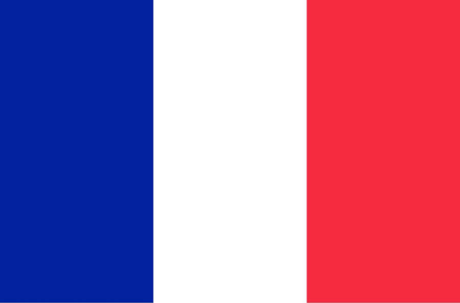 Gleaming French Flag Under Spotlight Wallpaper