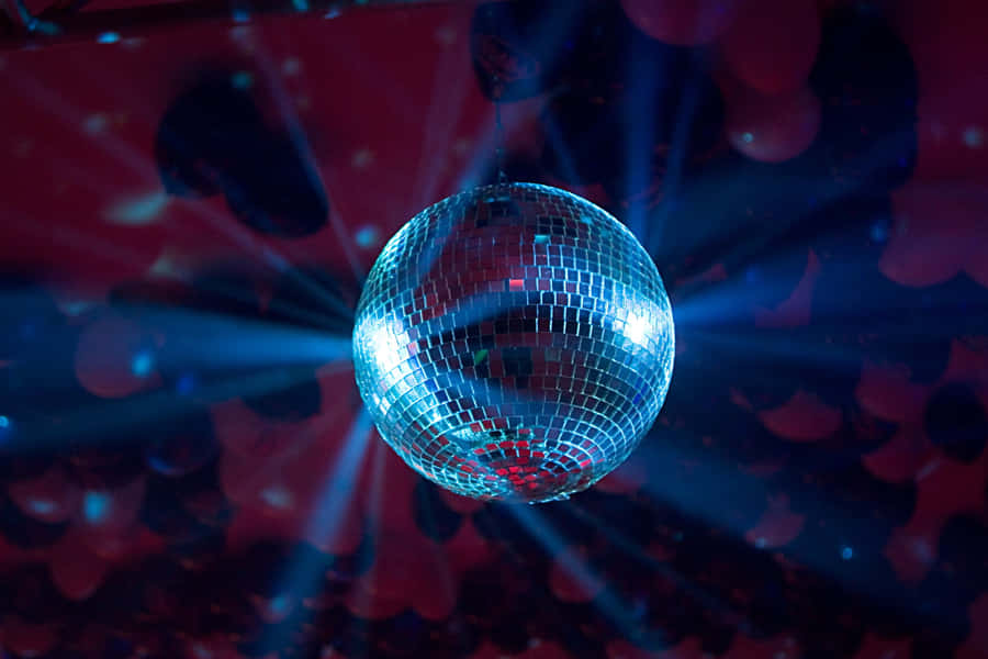 Glimmering Disco Ball Nightlife Vibe Wallpaper