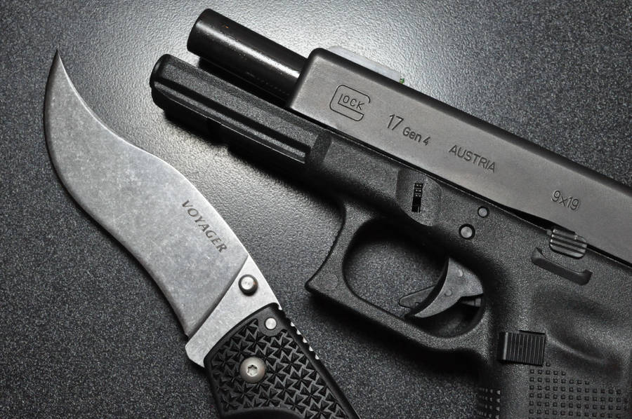 Glock 17 With Voyager Knife - The Perfect Outdoor Duo Wallpaper