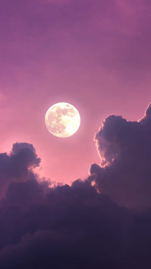 Glowing Pink Moon And Clouds Wallpaper