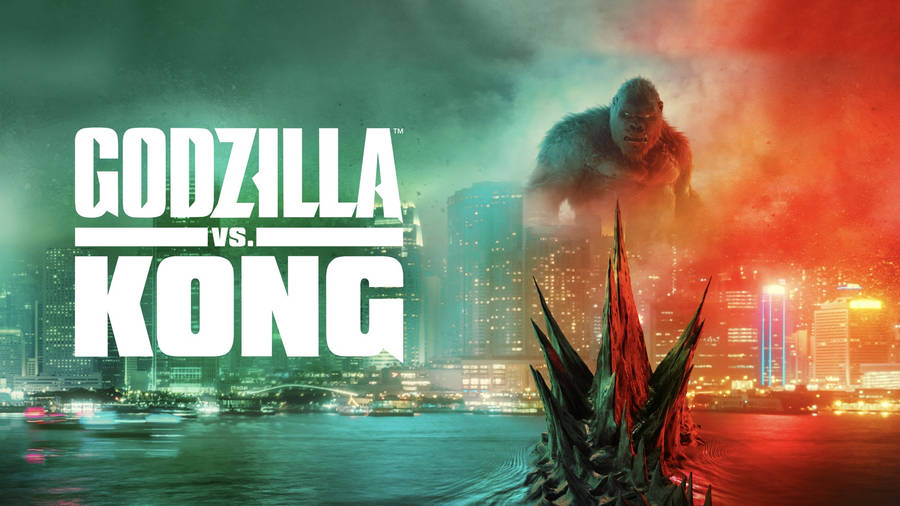 Godzilla Vs Kong - A City With A Large Statue Of Godzilla Wallpaper