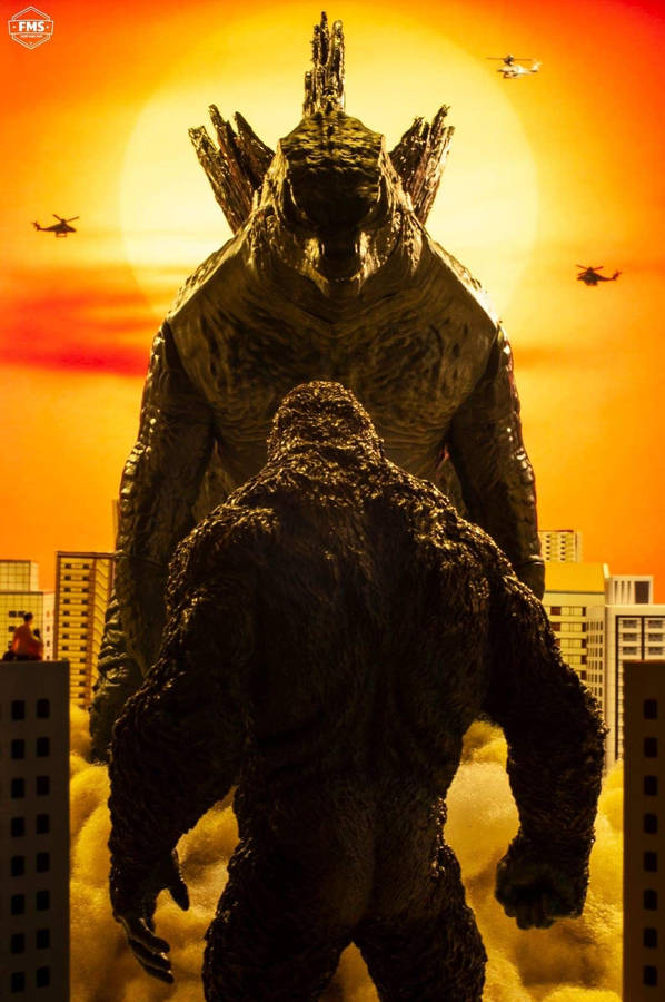 Godzilla Vs Kong Battling During Sunset Wallpaper