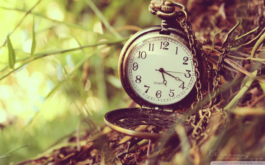 Gold-plated Pocket Watch Time Wallpaper