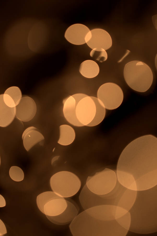 Golden Bokeh Phone Wallpaper