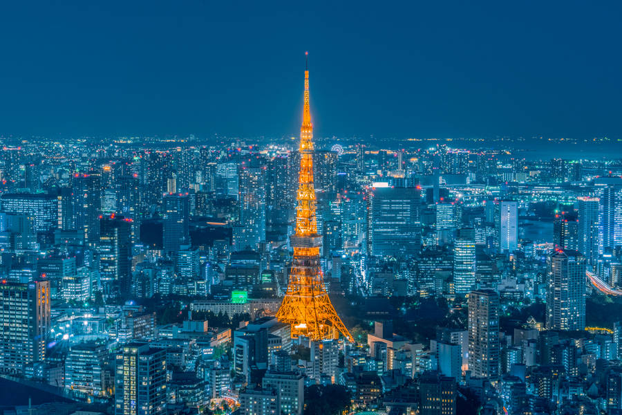 Golden Tokyo Tower Against Evening Sky Wallpaper