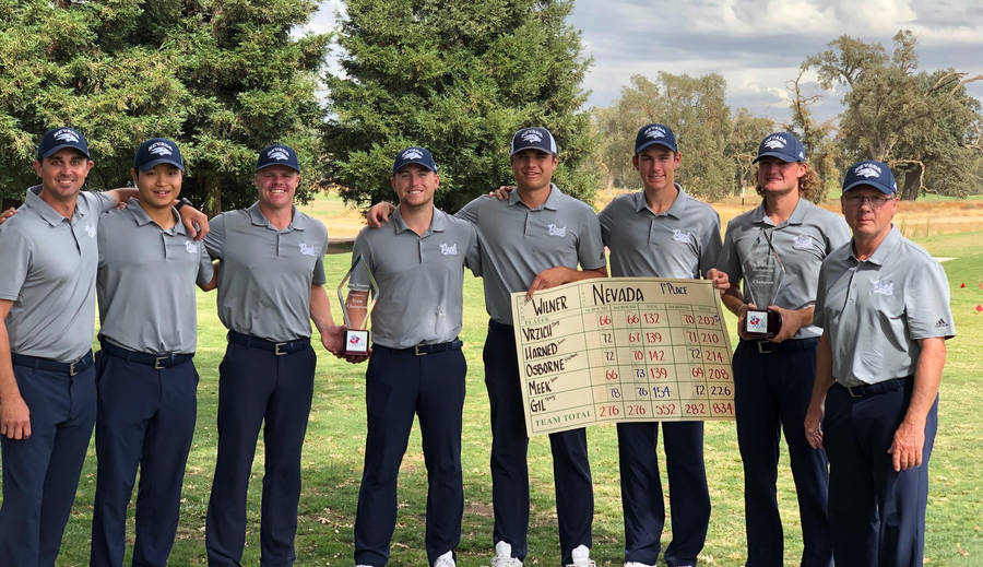 Golf Team Celebrationwith Trophy Wallpaper