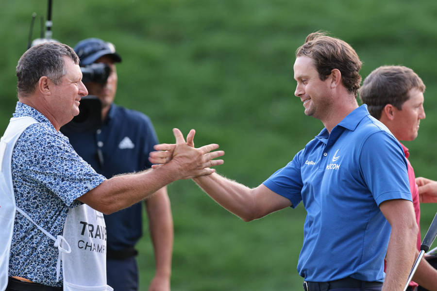 Golfer Harris English Sharing A High-five With Eric Larson Wallpaper