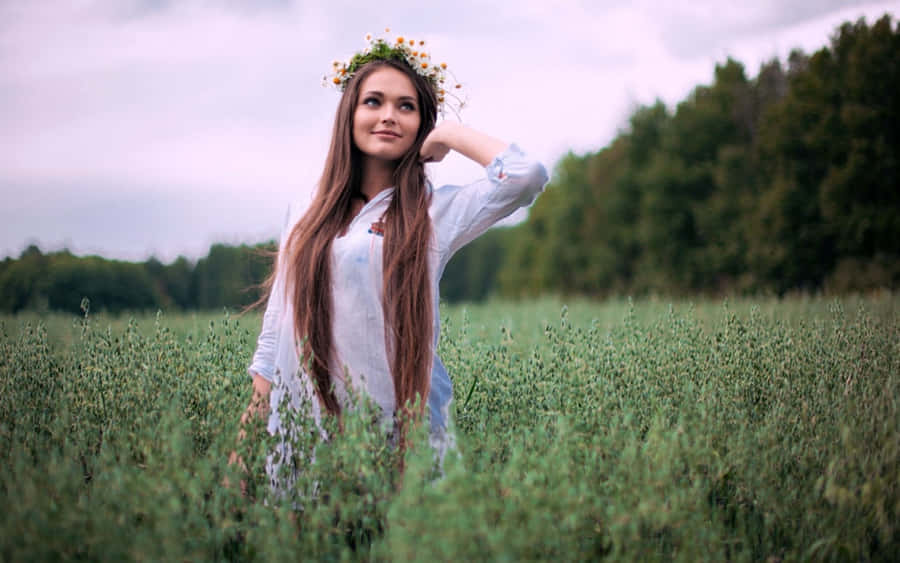 Graceful Amateur Model In Grass Field Wallpaper