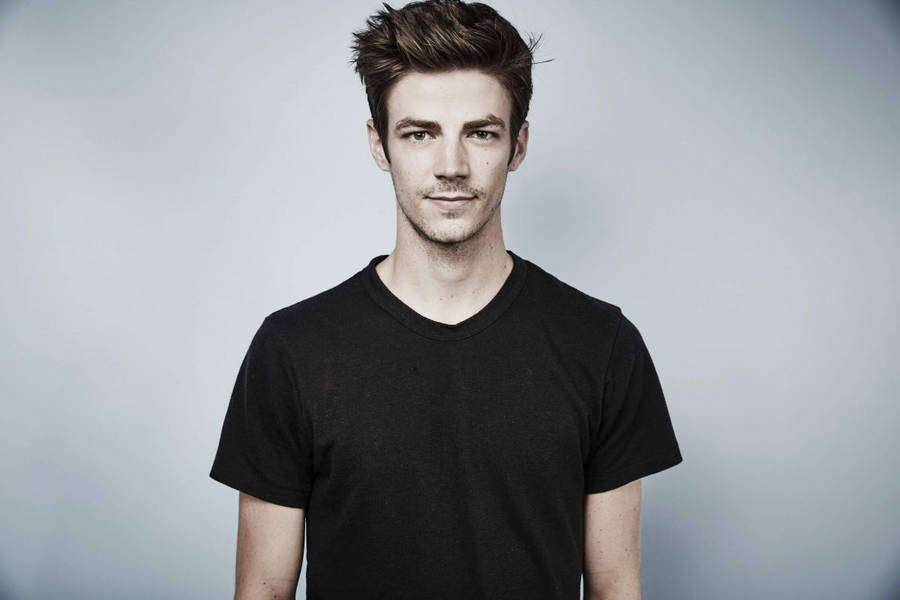 Grant Gustin In Black Casual Wallpaper