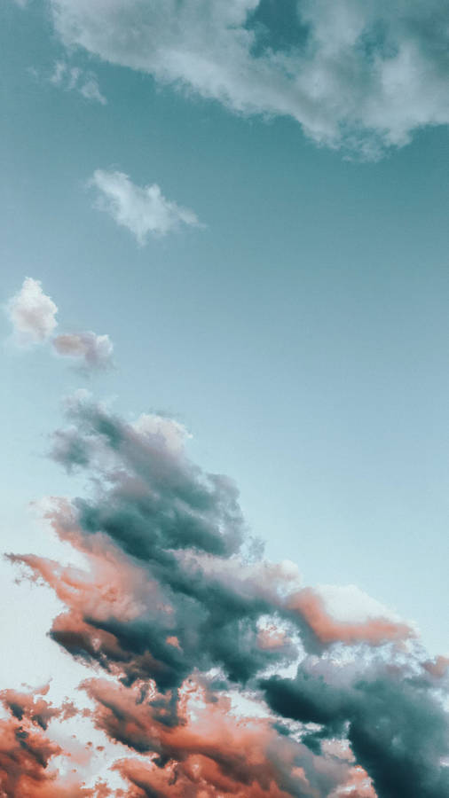 Gray And Orange Clouds Phone Wallpaper